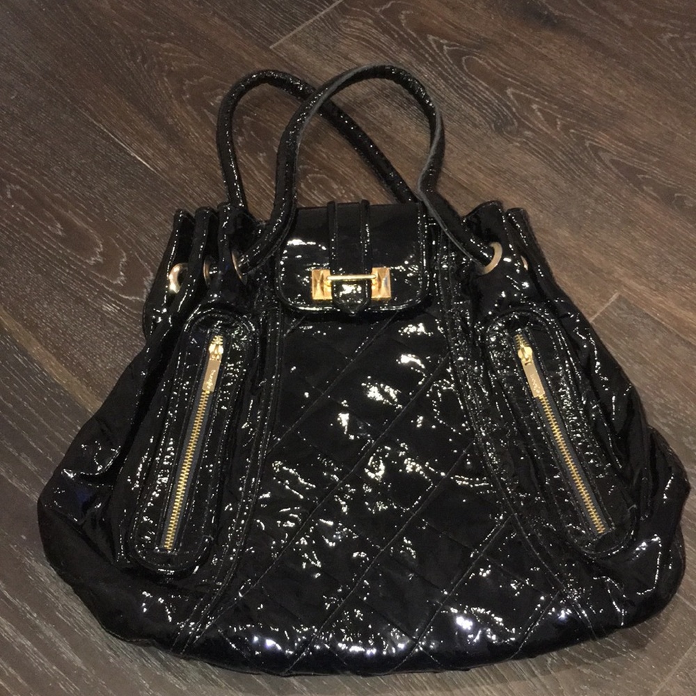 Treesje black patent leather with gold hardware